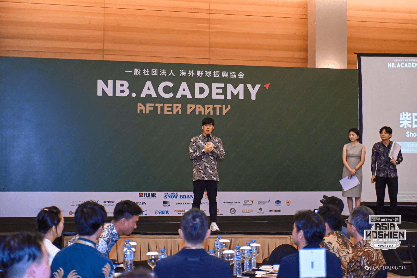 A speaker addressing the NB.ACADEMY Asia Koshien community event in Jakarta